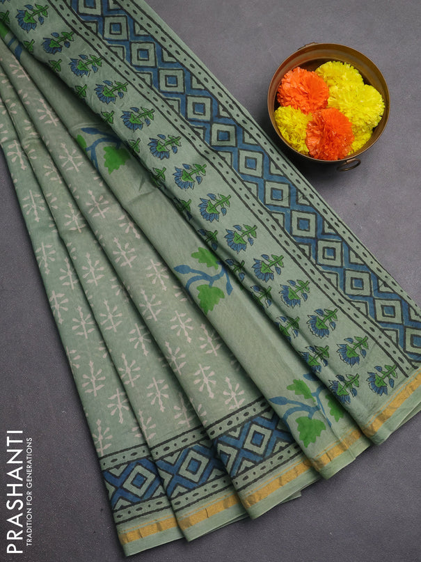 Chanderi bagru saree pastel green with allover batik prints and zari woven border