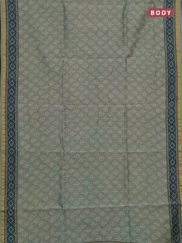 Chanderi bagru saree pastel green with allover batik prints and zari woven border