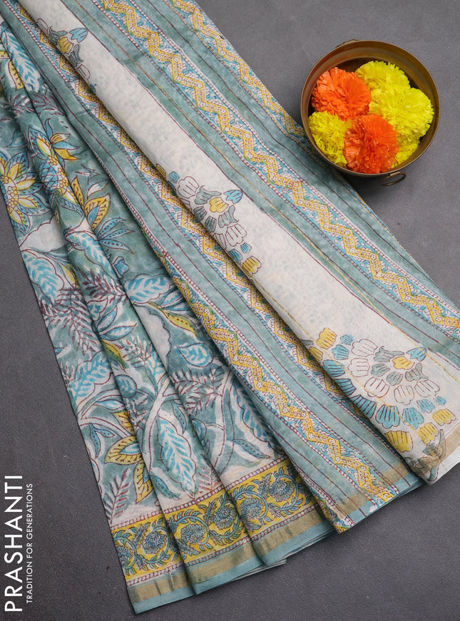 Chanderi bagru saree pastel green with allover kalamkari prints and zari woven border