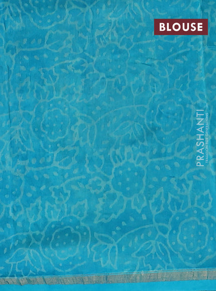 Chanderi bagru saree teal green with allover batik prints and zari woven border