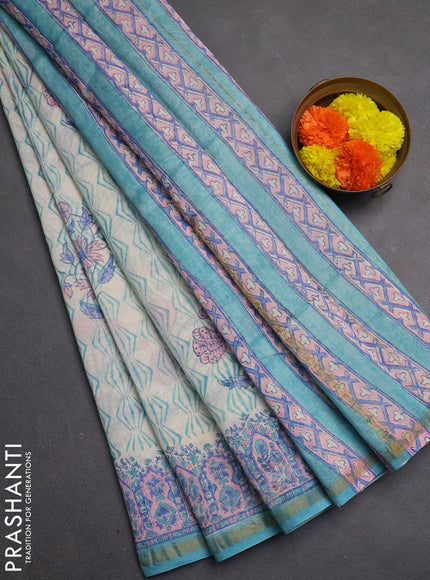 Chanderi bagru saree off white and teal green shade with allover prints and zari woven border