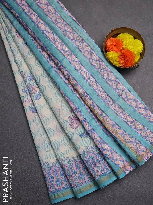Chanderi bagru saree off white and teal green shade with allover prints and zari woven border