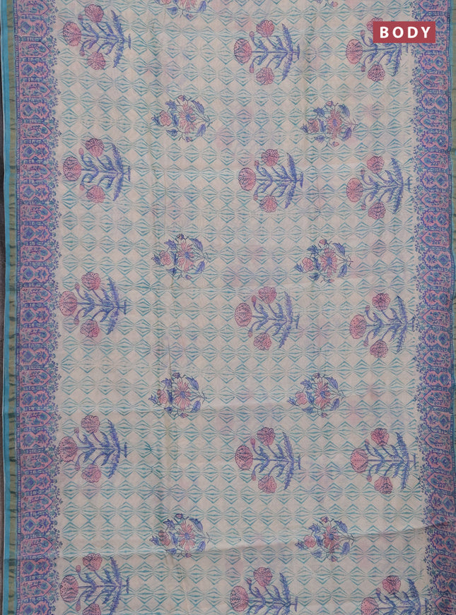 Chanderi bagru saree off white and teal green shade with allover prints and zari woven border