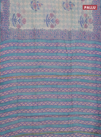 Chanderi bagru saree off white and teal green shade with allover prints and zari woven border