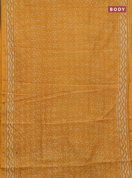 Chanderi bagru saree mustard yellow with allover dabu prints and zari woven border