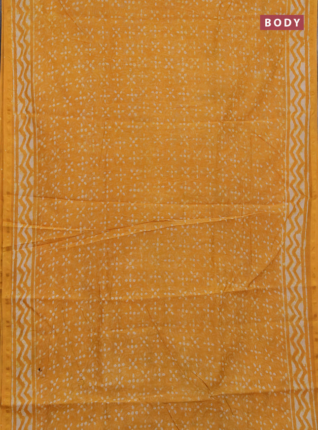 Chanderi bagru saree mustard yellow with allover dabu prints and zari woven border