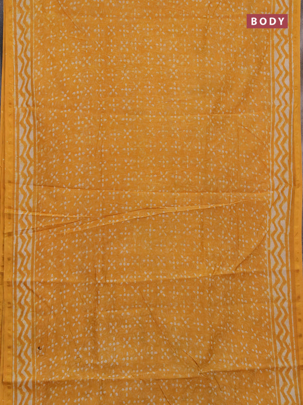 Chanderi bagru saree mustard yellow with allover dabu prints and zari woven border