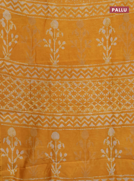 Chanderi bagru saree mustard yellow with allover dabu prints and zari woven border