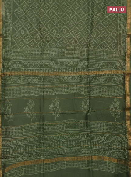 Chanderi bagru saree light green with allover batik prints and maheshwari border
