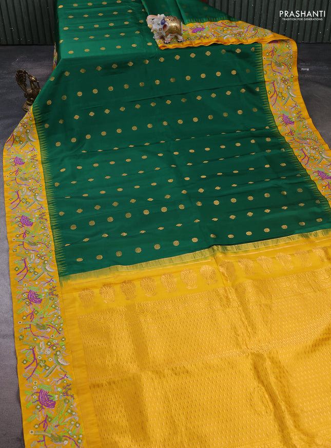 Pure gadwal silk saree green and mango yellow with allover zari woven buttas and temple design convent embroidery