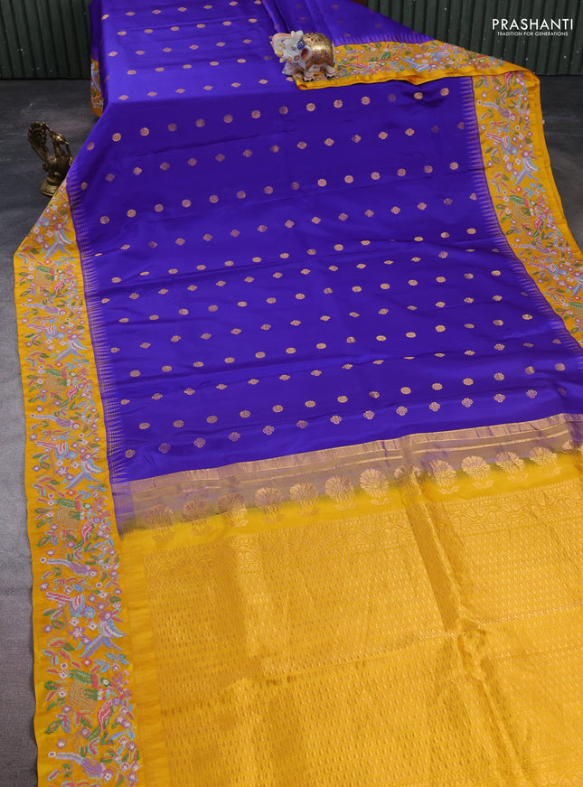 Pure gadwal silk saree royal blue and mango yellow with allover zari woven buttas and temple design convent embroidery