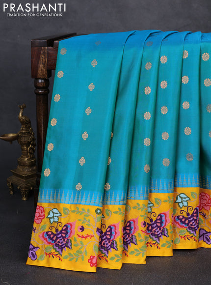 Pure gadwal silk saree dual shade of bluish green and yellow with allover zari woven buttas and temple design convent embroidery