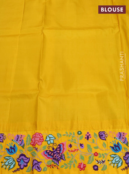Pure gadwal silk saree dual shade of bluish green and yellow with allover zari woven buttas and temple design convent embroidery