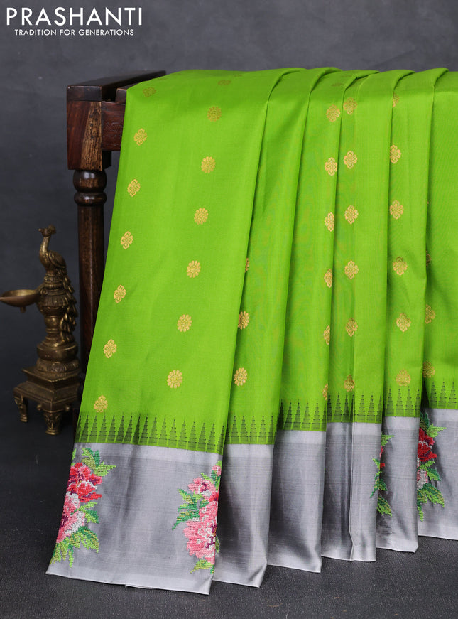 Pure gadwal silk saree light green and grey with allover zari woven buttas and temple design convent embroidery