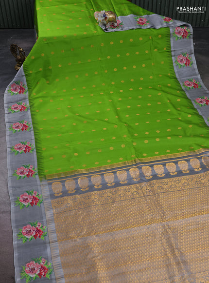 Pure gadwal silk saree light green and grey with allover zari woven buttas and temple design convent embroidery