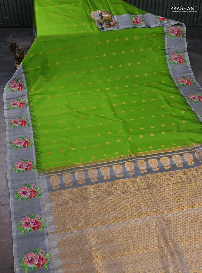 Pure gadwal silk saree light green and grey with allover zari woven buttas and temple design convent embroidery