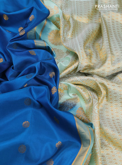 Pure gadwal silk saree peacock blue and teal green with allover zari woven buttas and temple design convent embroidery
