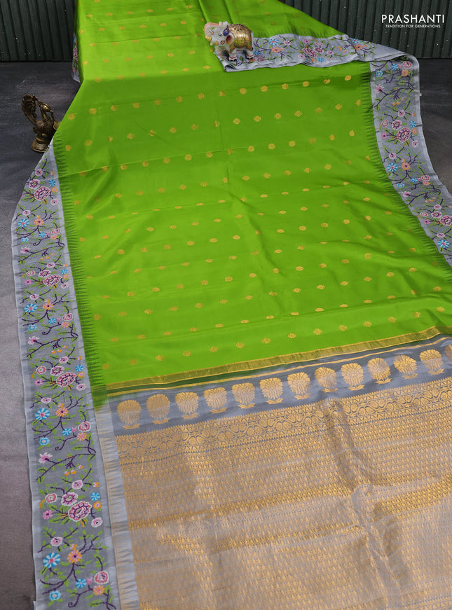 Pure gadwal silk saree light green and grey with allover zari woven buttas and temple design convent embroidery