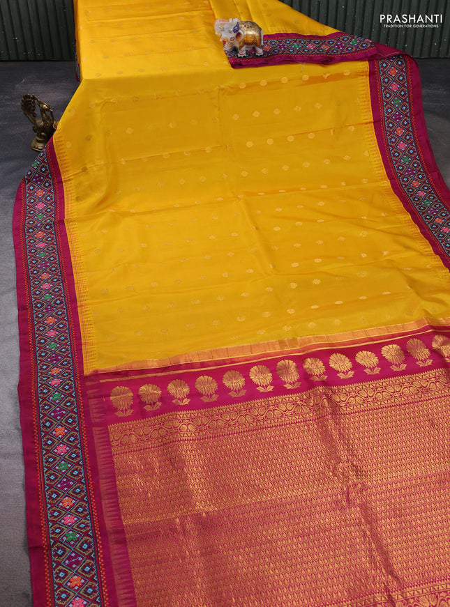 Pure gadwal silk saree yellow and wine shade with allover zari woven buttas and temple design convent embroidery