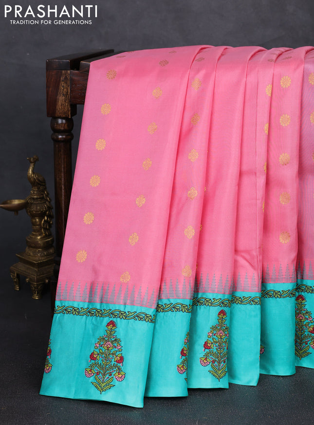 Pure gadwal silk saree peach pink and teal green with allover zari woven buttas and temple design convent embroidery
