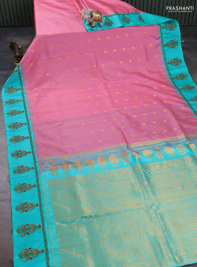 Pure gadwal silk saree peach pink and teal green with allover zari woven buttas and temple design convent embroidery