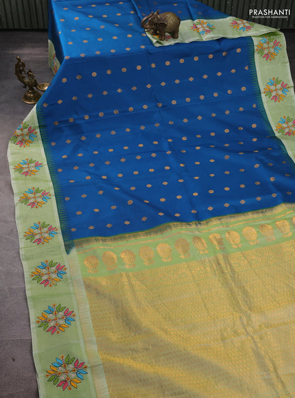 Pure gadwal silk saree peacock blue and pista green with allover zari woven buttas and temple design convent embroidery