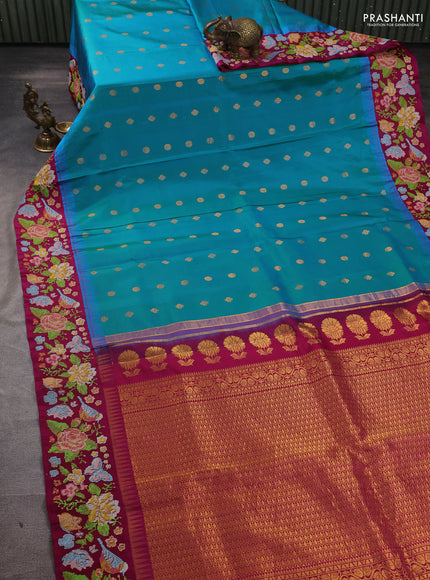 Pure gadwal silk saree dual shade of bluish green and magenta pink with allover zari woven buttas and temple design convent embroidery