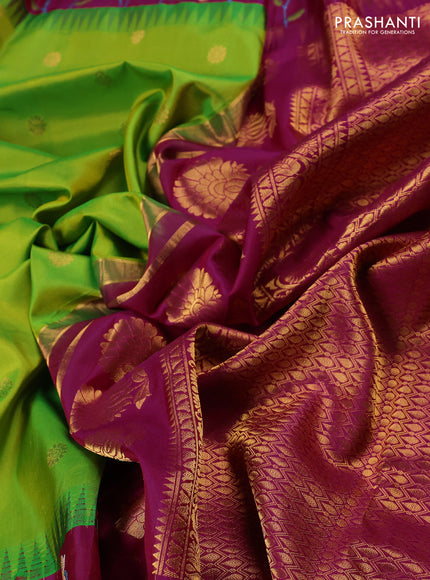 Pure gadwal silk saree light green and magenta pink with allover zari woven buttas and temple design convent embroidery