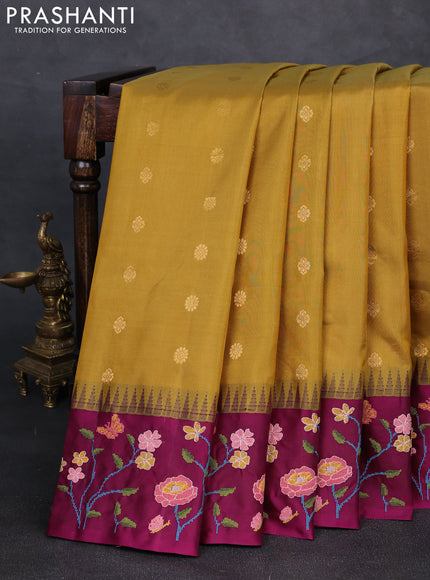 Pure gadwal silk saree dark mustard and purple with allover zari woven buttas and temple design convent embroidery