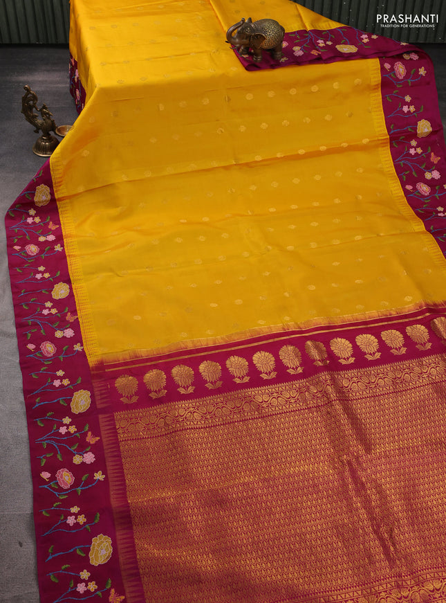 Pure gadwal silk saree mango yellow and magenta pink with allover zari woven buttas and temple design convent embroidery