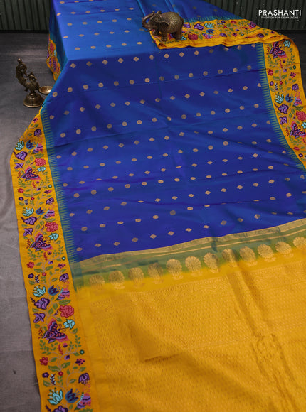 Pure gadwal silk saree dual shade of bluish green and mango yellow with allover zari woven buttas and temple design convent embroidery
