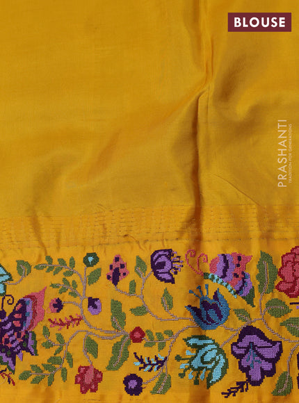 Pure gadwal silk saree dual shade of bluish green and mango yellow with allover zari woven buttas and temple design convent embroidery