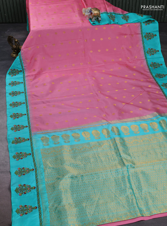 Pure gadwal silk saree peach pink and teal green with allover zari woven buttas and temple design convent embroidery