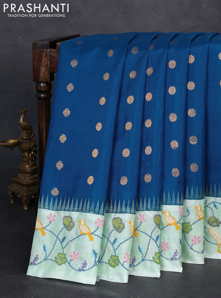 Pure gadwal silk saree peacock blue and pista green with allover zari woven buttas and temple design convent embroidery