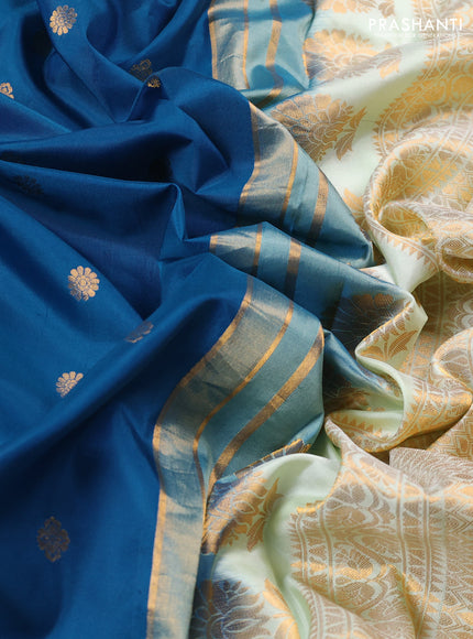 Pure gadwal silk saree peacock blue and pista green with allover zari woven buttas and temple design convent embroidery