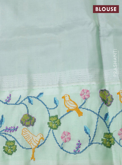 Pure gadwal silk saree peacock blue and pista green with allover zari woven buttas and temple design convent embroidery