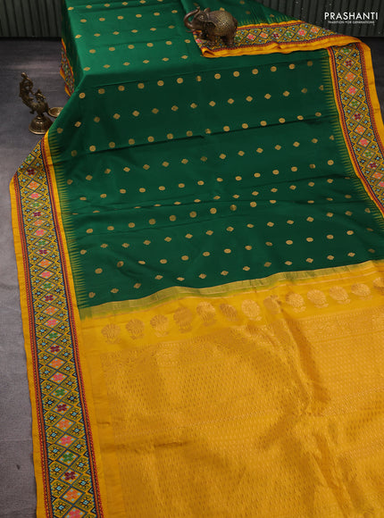 Pure gadwal silk saree green and mango yellow with allover zari woven buttas and temple design convent embroidery