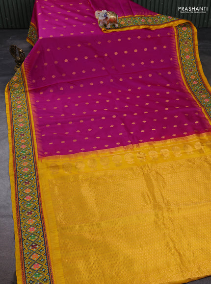 Pure gadwal silk saree pink and mango yellow with allover zari woven buttas and temple design convent embroidery