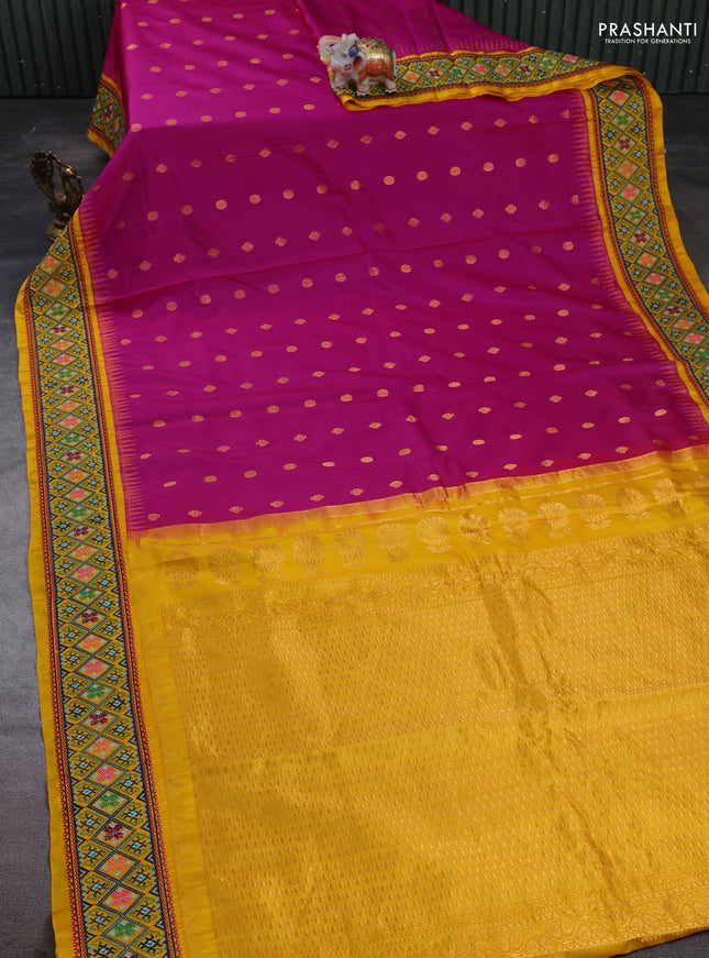 Pure gadwal silk saree pink and mango yellow with allover zari woven buttas and temple design convent embroidery