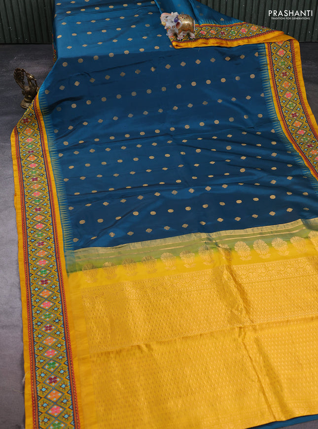 Pure gadwal silk saree peacock green and mango yellow with allover zari woven buttas and temple design convent embroidery