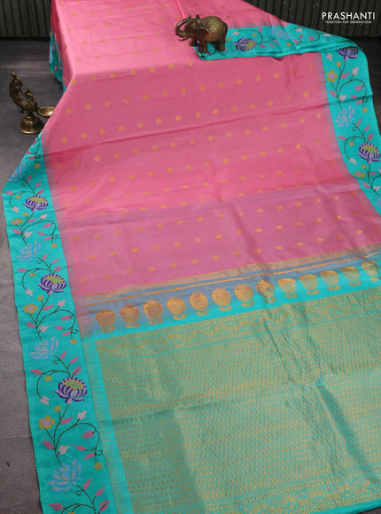 Pure gadwal silk saree peach pink and teal green with allover zari woven buttas and temple design convent embroidery