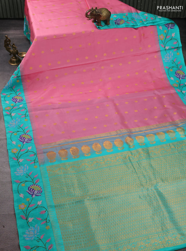 Pure gadwal silk saree peach pink and teal green with allover zari woven buttas and temple design convent embroidery