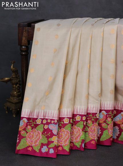 Pure gadwal silk saree beige and magenta pink with allover zari woven buttas and temple design convent embroidery