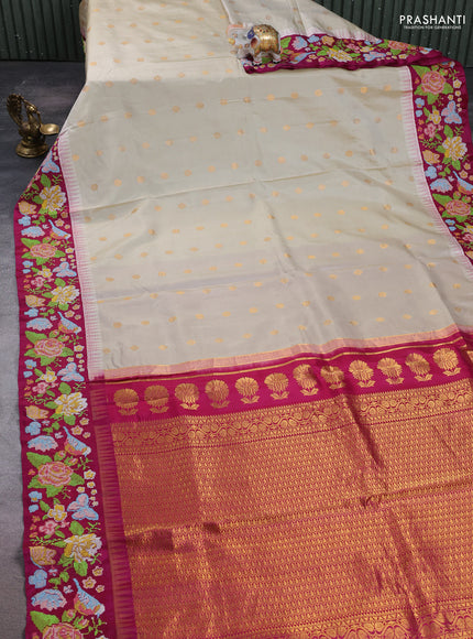 Pure gadwal silk saree beige and magenta pink with allover zari woven buttas and temple design convent embroidery