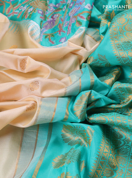 Pure gadwal silk saree cream and teal green with allover zari woven buttas and temple design convent embroidery