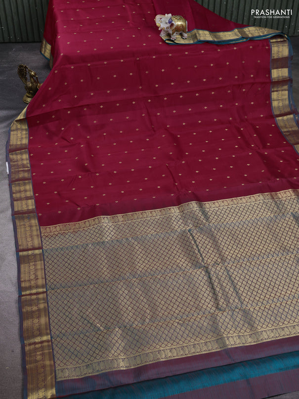 Kanchipuram silk saree reddish pink and teal green with allover zari woven buttas and zari woven border