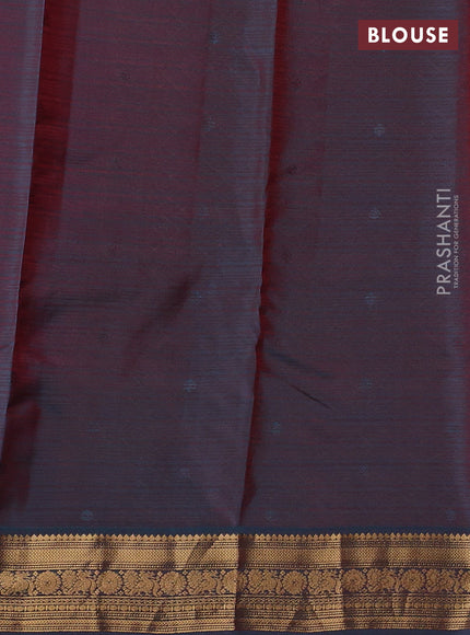 Kanchipuram silk saree reddish pink and teal green with allover zari woven buttas and zari woven border