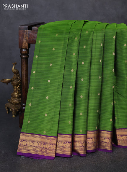 Kanchipuram silk saree sap green and purple with allover zari woven buttas and zari woven border