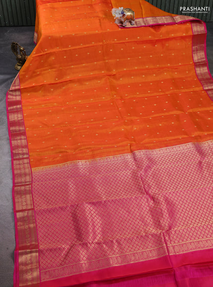 Kanchipuram silk saree orange and pink with allover zari woven buttas and zari woven border