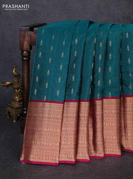 Kanchipuram silk saree peacock green and magenta pink with allover zari woven buttas and long zari woven border
